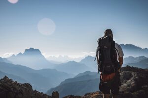 a man hiking on a mountain